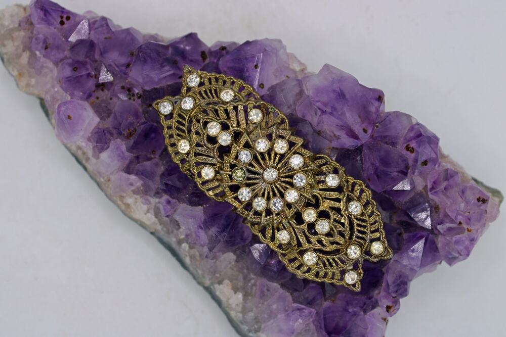 Vintage Little Nemo Gold Tone Rhinestone Filigree Brooch